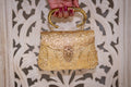 SAYA Golden Clutch